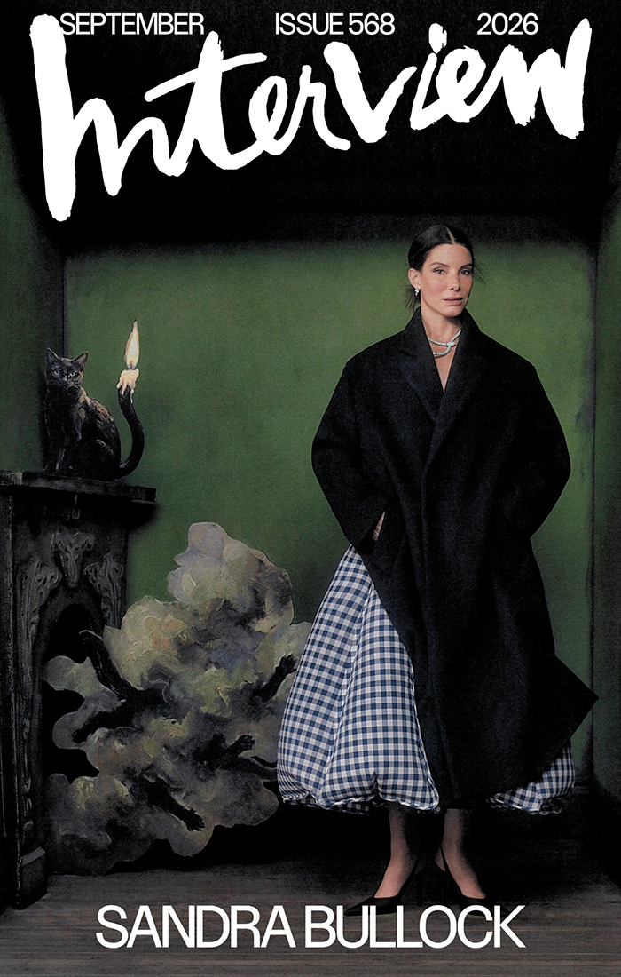 Sandra Bullock on Interview magazine cover, wearing a long black coat and plaid dress, amid Jesse James cheating. Sandra Bullock on Interview magazine cover, wearing a long black coat and plaid dress, amid Jesse James cheating.