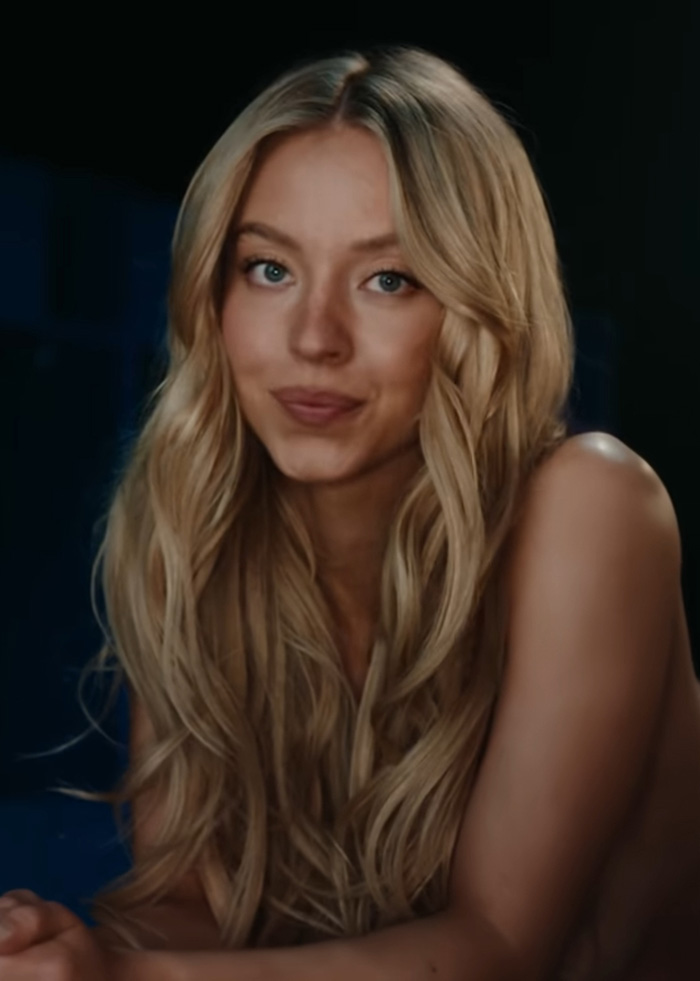 Sydney Sweeney smiles for the camera, part of a betting ad parody. Sydney Sweeney smiles for the camera, part of a betting ad parody.