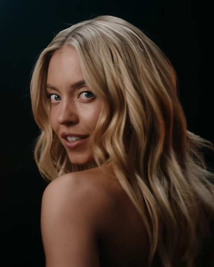 Sydney Sweeney looking over her shoulder, a poignant response after her ad campaign sparked backlash. Sydney Sweeney looking over her shoulder, a poignant response after her ad campaign sparked backlash.