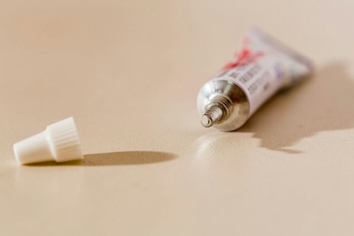 An open tube of ointment, often misused by strange patients with bizarre medical issues.