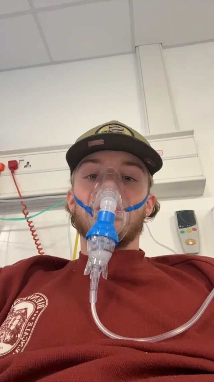 Teen in hospital with an oxygen mask, dealing with a health scare from a vaping habit. Teen in hospital with an oxygen mask, dealing with a health scare from a vaping habit.