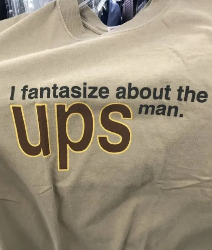 An unhinged secondhand t-shirt featuring the phrase I fantasize about the UPS man.