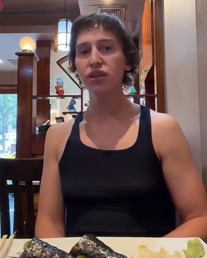 Trans woman in a Japanese restaurant, fueling a cultural debate.
