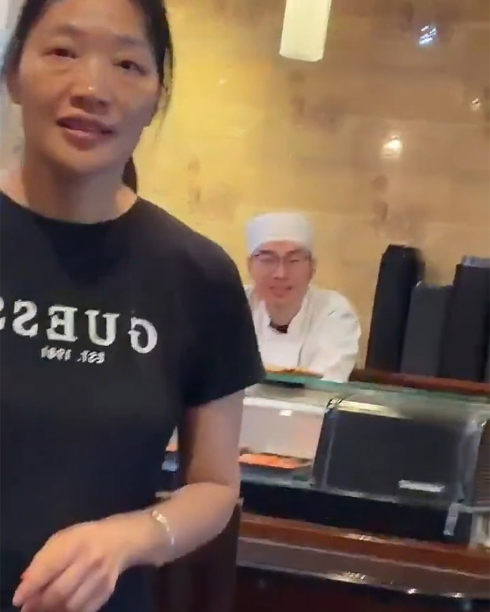 Staff at a Japanese restaurant, part of a cultural debate involving a trans woman.