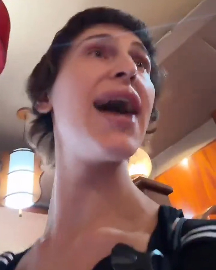 Close-up of the trans woman speaking, at the center of the cultural debate surrounding the Japanese restaurant incident.
