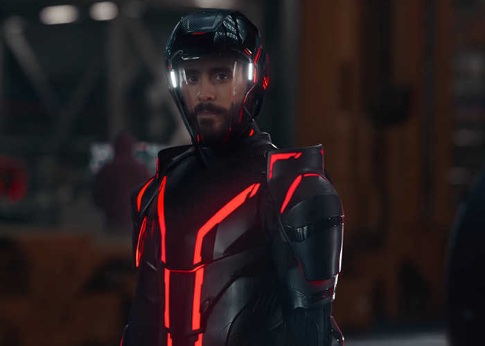 Jared Leto in a futuristic black and red suit with a helmet, representing his role that involved method acting. Jared Leto in a futuristic black and red suit with a helmet, representing his role that involved method acting.