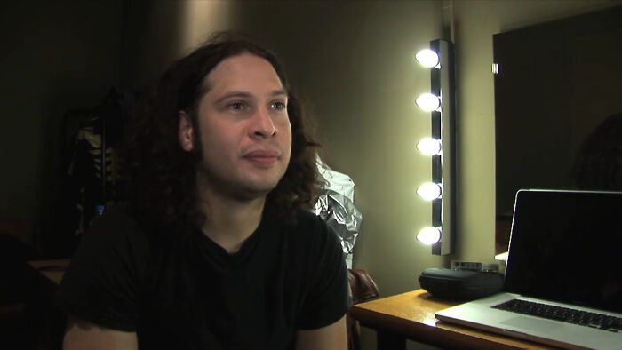 Ray Toro in a dressing room, a key figure in fan celebrity encounters.