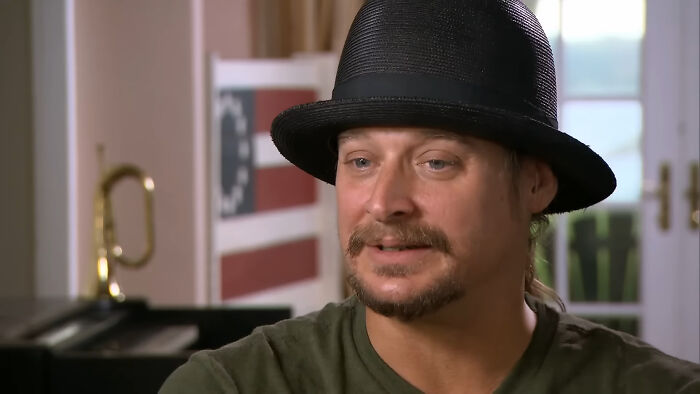Musician Kid Rock wearing a black hat, a memorable figure in celebrity encounters