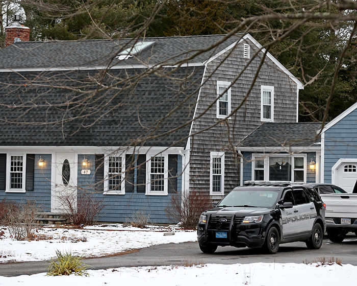A police car outside a house, related to Lindsay Clancy's case and the odd sticker on her wheelchair. A police car outside a house, related to Lindsay Clancy's case and the odd sticker on her wheelchair.