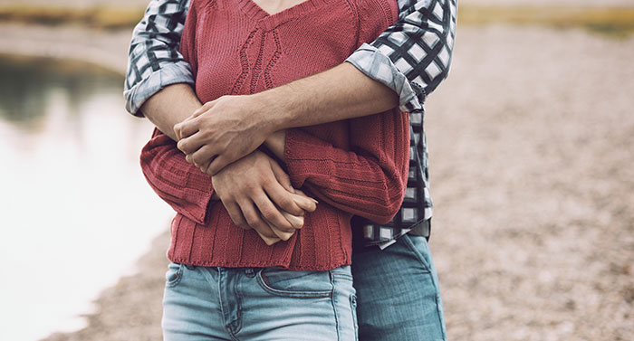 A couple embracing. Women who turned down marriage proposals and made the right choice.