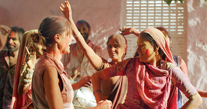 Women dancing, celebrating with color, having turned down marriage proposals and knowing they made the right choice.