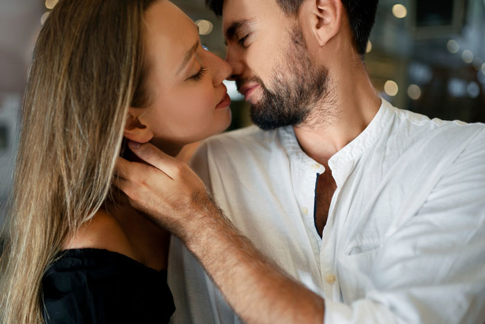 A couple in a tender embrace, showcasing connection beyond the nonsensical sentences men say.