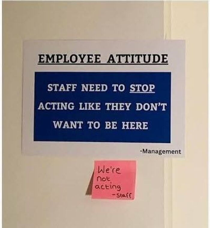 Workplace sign about employee attitude with staff reply note