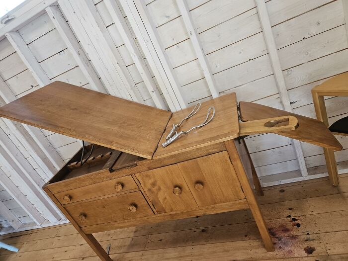 An antique wooden medical table showing how medicine has changed throughout history