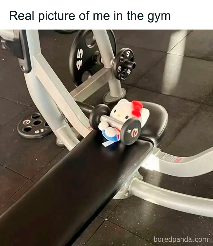 Relatable female gym meme with Hello Kitty toy lifting small weight