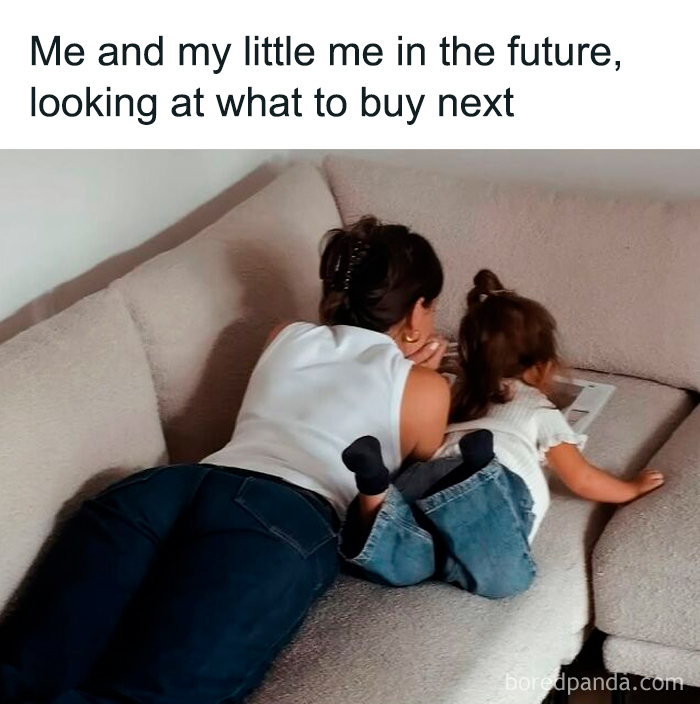 Woman and child lying on sofa looking at tablet representing female memes