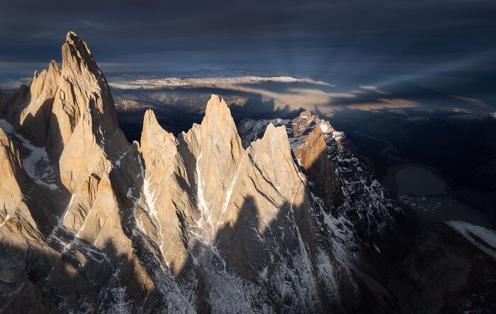 Dramatic sharp mountain peaks illuminated in Natural Landscape Photography Awards 2026