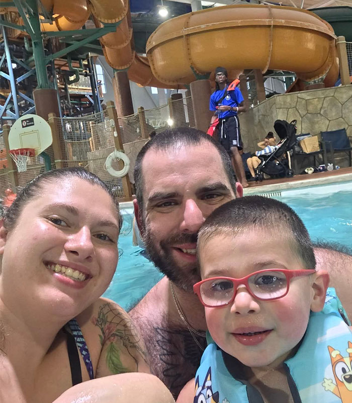 Family enjoying indoor water park at popular family resort