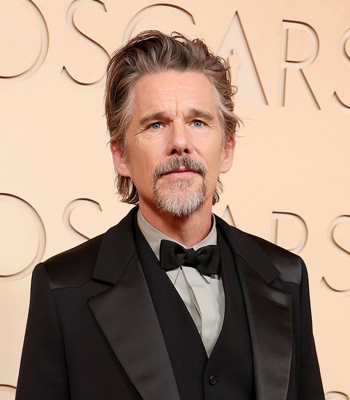 Ethan Hawke posing in a tux amid his Hollywood star's cheating scandal outrage. Ethan Hawke posing in a tux amid his Hollywood star's cheating scandal outrage.