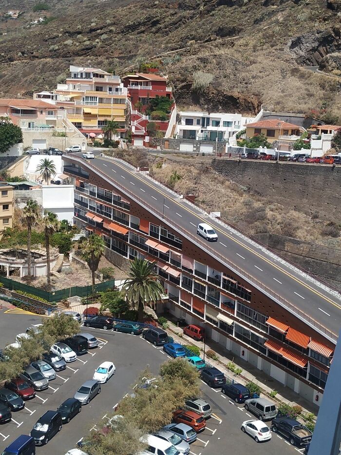 Road constructed on top of a building creating an unsafe structure