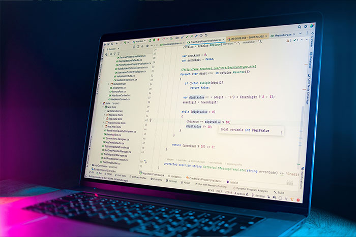 Close-up of computer code on a laptop screen symbolizing AI agent swarms hacking threats. Close-up of computer code on a laptop screen symbolizing AI agent swarms hacking threats.