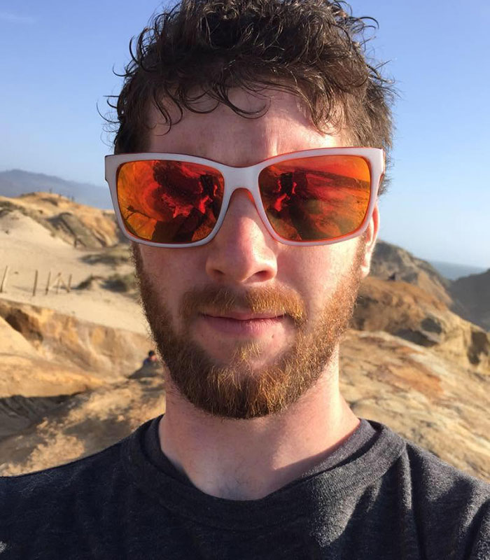 Man wearing sunglasses outdoors associated with the violent family history in the Oregon elementary school tragedy.