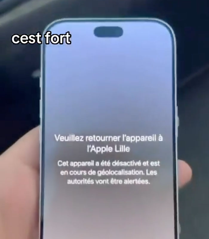 An iPhone screen displaying a nightmare notification in French for looters in France.