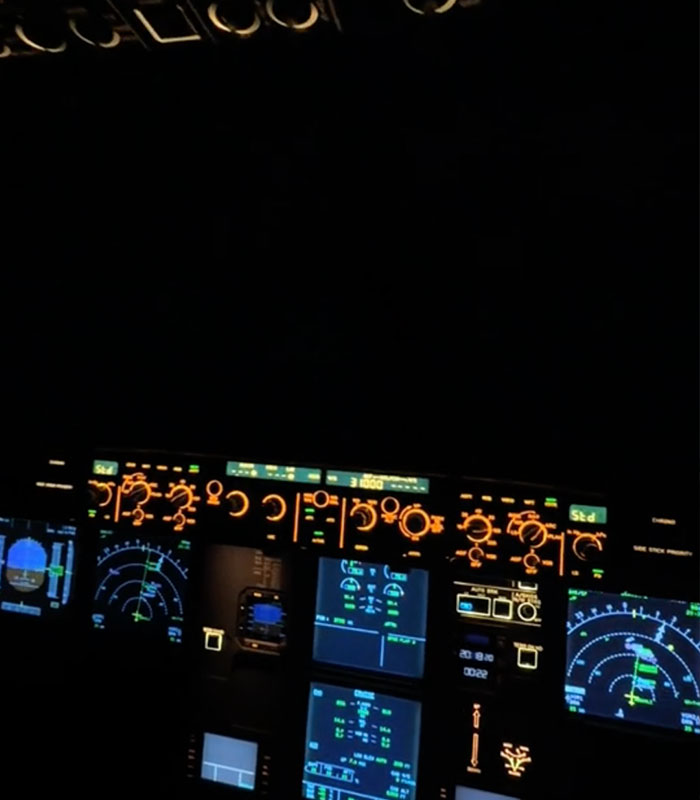 Illuminated dashboard instruments during nighttime flying in complete darkness. Illuminated dashboard instruments during nighttime flying in complete darkness.