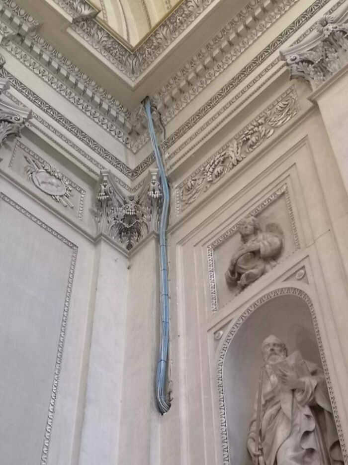 Interior construction fail with exposed cables ruining classic architectural design