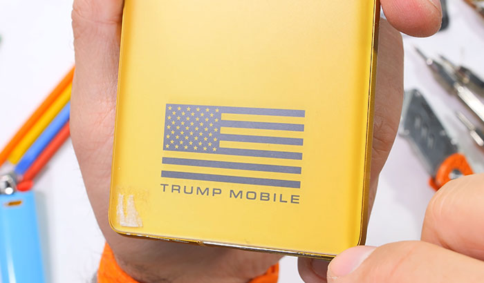 Close up view of the gold back casing of the Trump Mobile phone showing an American flag logo