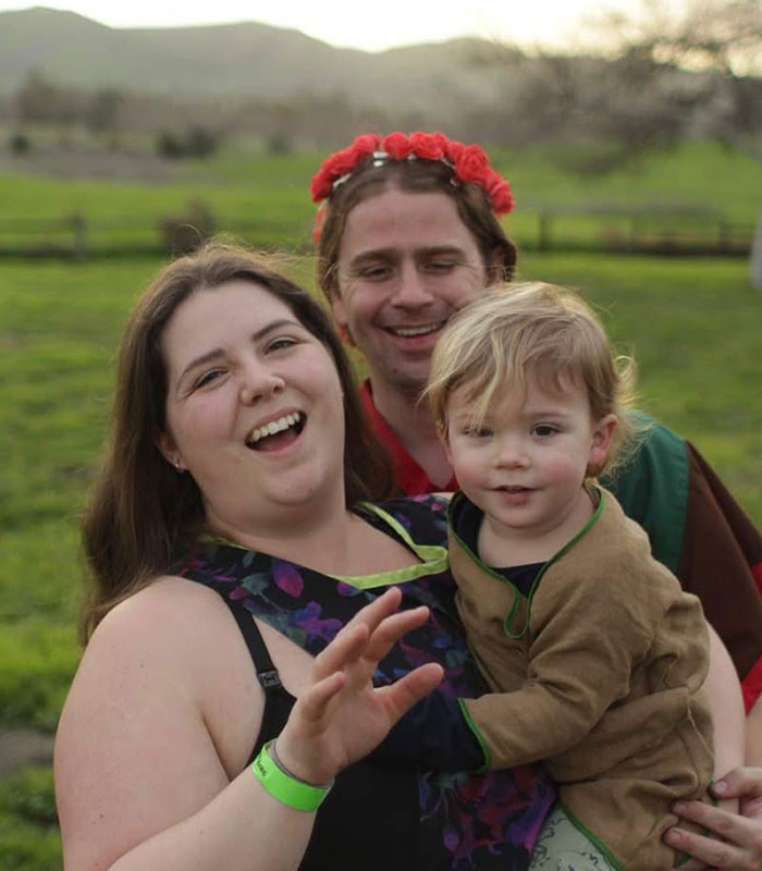 Family smiling outdoors amidst Oregon elementary school tragedy news