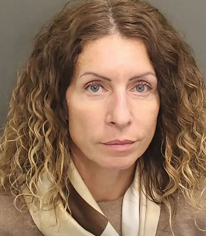 Mugshot photo showing the mom arrested after leaving kids home alone Mugshot photo showing the mom arrested after leaving kids home alone