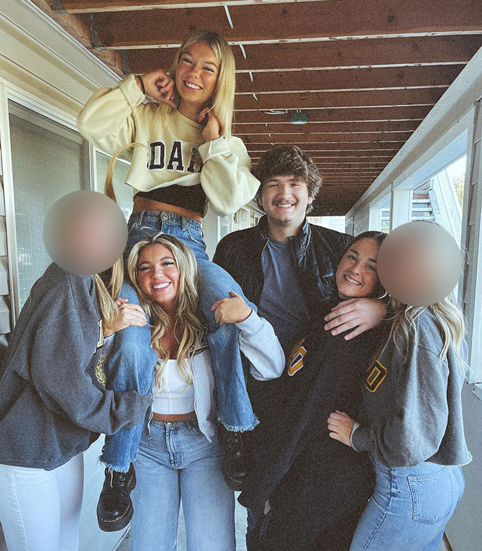 A group of friends smiling together on a porch, connected to the Idaho tragedy case