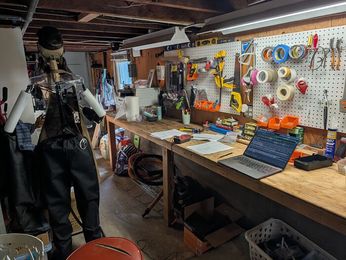 A workshop bench setup featuring laptop code and tools used to build Uncle Murray, a talking skeleton. A workshop bench setup featuring laptop code and tools used to build Uncle Murray, a talking skeleton.