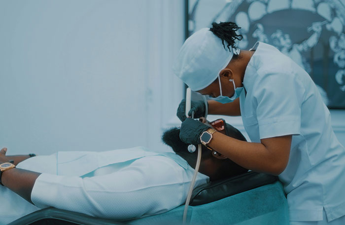 Healthcare professional examining patient possibly for skin white spots