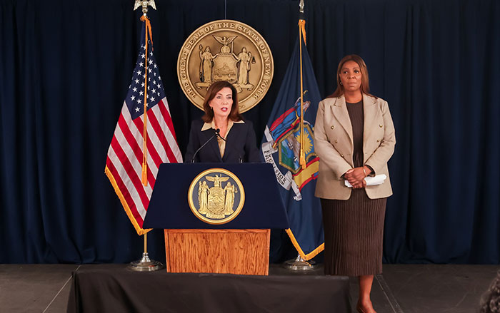 Kathy Hochul stands at a podium giving a press conference related to the Cornell 7 student investigation Kathy Hochul stands at a podium giving a press conference related to the Cornell 7 student investigation