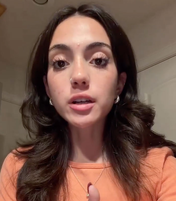 A close-up of a woman talking about her experience with belly bloating issues. A close-up of a woman talking about her experience with belly bloating issues.