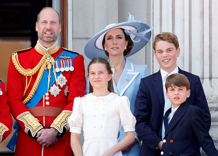 Prince William, Kate, Prince George, Princess Charlotte, and Prince Louis standing together on the balcony. Prince William, Kate, Prince George, Princess Charlotte, and Prince Louis standing together on the balcony.