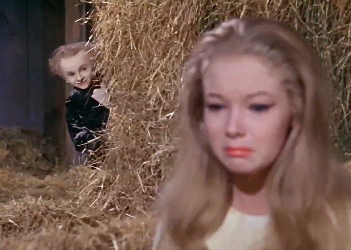 The Rumpelstiltskin Tiptoe man peeking from behind a haystack at a crying woman. The Rumpelstiltskin Tiptoe man peeking from behind a haystack at a crying woman.