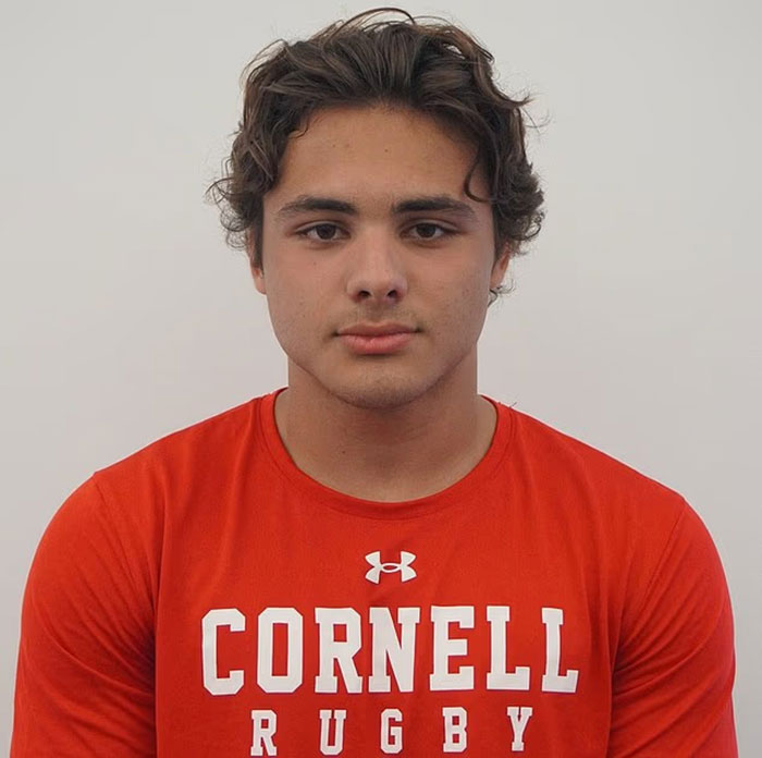Cornell 7 frat bro wearing a red shirt facing forward
