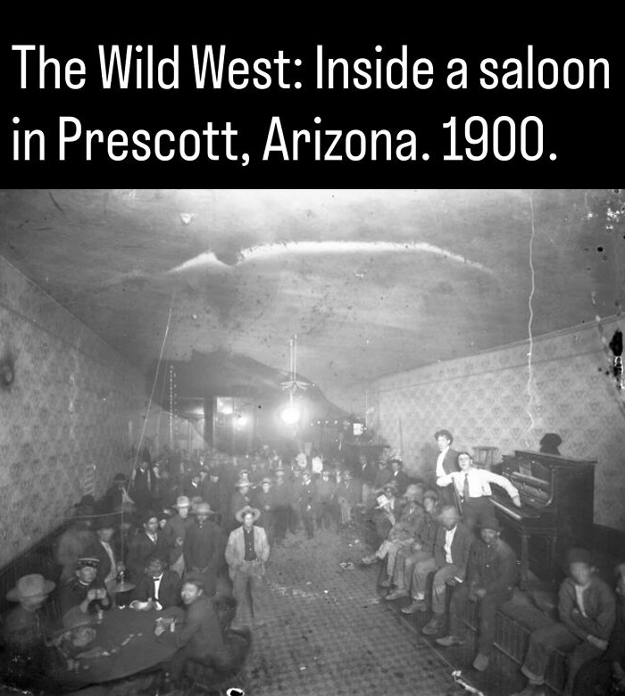 Historic 1900 photo showing patrons inside a crowded Wild West saloon in Prescott, Arizona, full of fascinating facts.