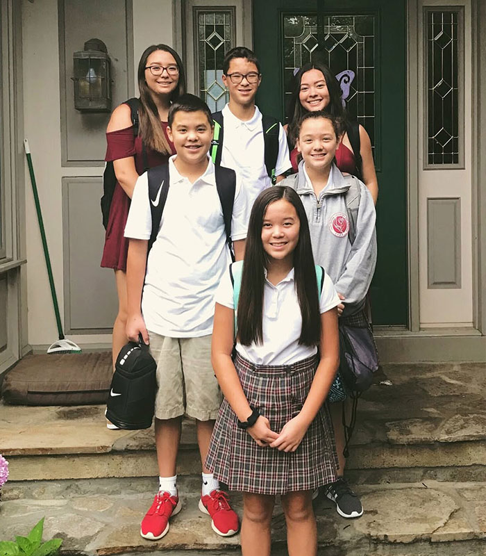 The Gosselin kids posing together on the front steps, representing Jon Gosselin’s family The Gosselin kids posing together on the front steps, representing Jon Gosselin’s family