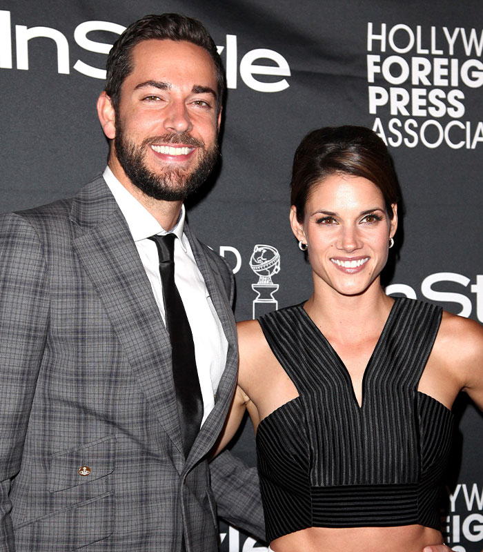 Zachary Levi and Missy Peregrym smiling on the red carpet, a couple with short celebrity marriages.