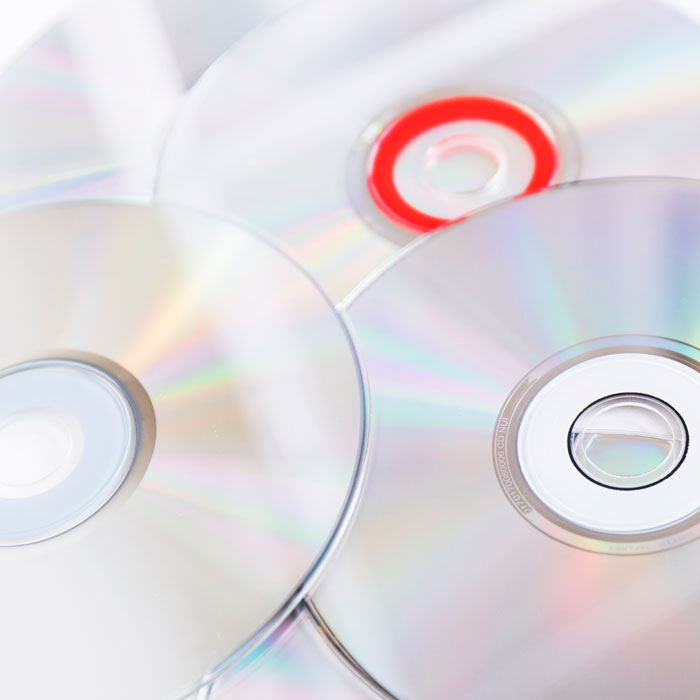 A pile of shiny compact discs that feature in bitter divorce stories