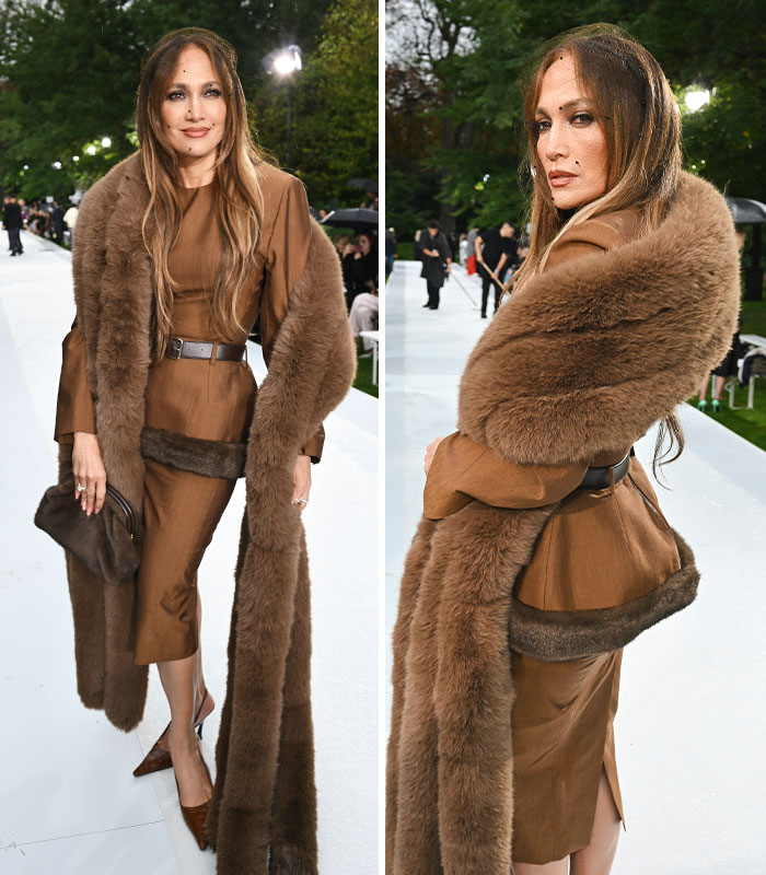 Jennifer Lopez in a brown dress and matching fur shawl at the Paris Fashion Week.