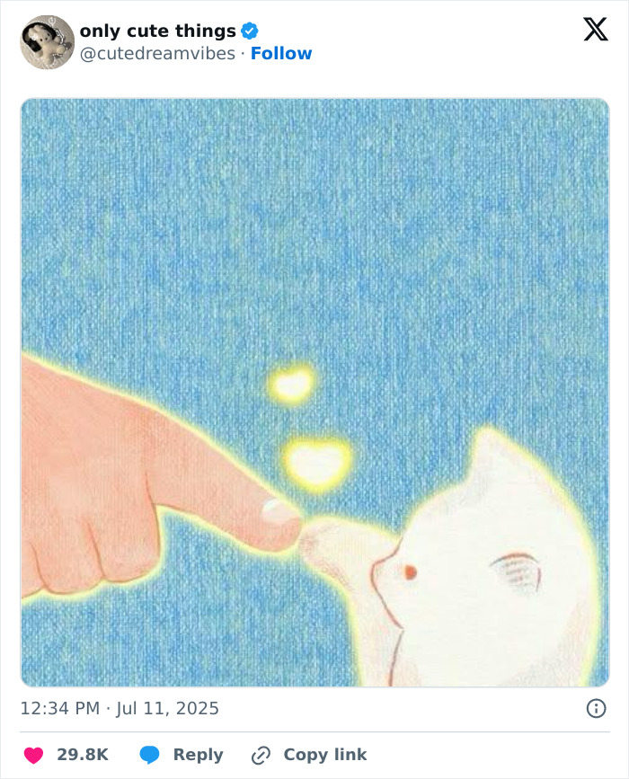 Hand and cat touching fingers with glowing heart symbols