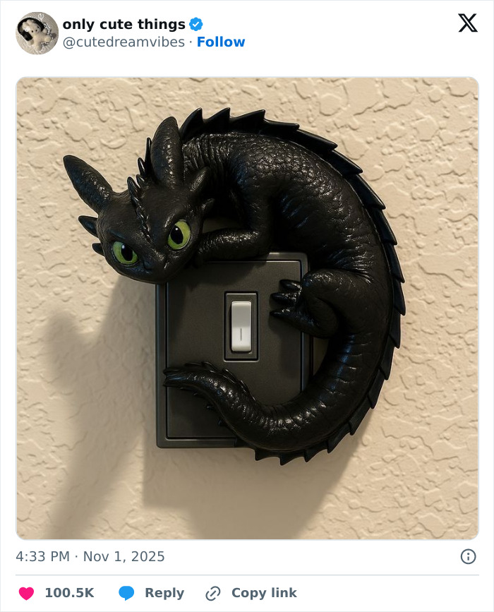 Toothless dragon figure wrapped around a light switch on a textured wall