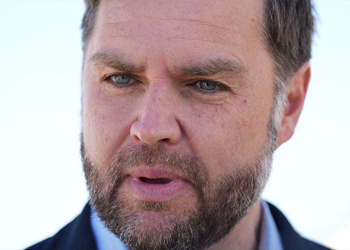 Close-up portrait of politician JD Vance speaking. Close-up portrait of politician JD Vance speaking.