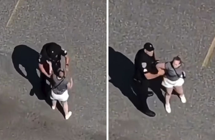 Police officer handcuffing woman outdoors in Halloween-related incident Police officer handcuffing woman outdoors in Halloween-related incident
