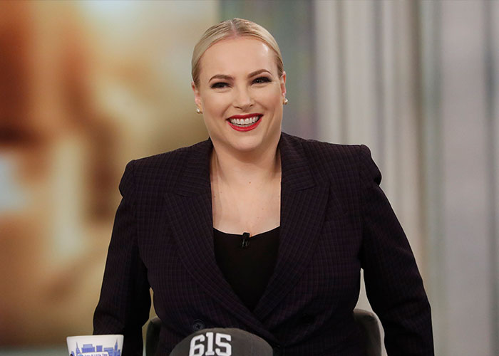 Meghan McCain smiling on set, representing a conservative woman sharing her views on trends. Meghan McCain smiling on set, representing a conservative woman sharing her views on trends.